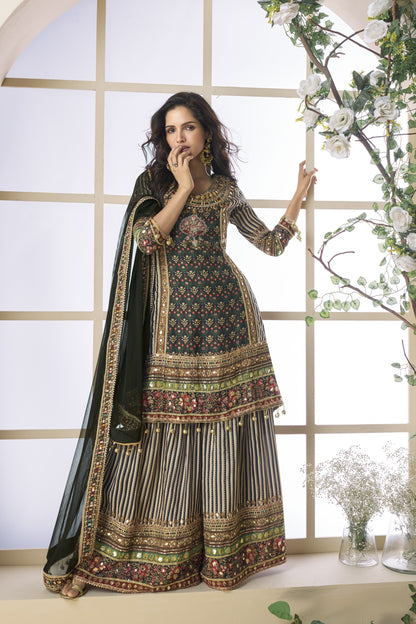 Black and grey color palazzo suit in viscose fabric with hand zari and embellished work, blending modern tones with traditional elegance for festive wear.
