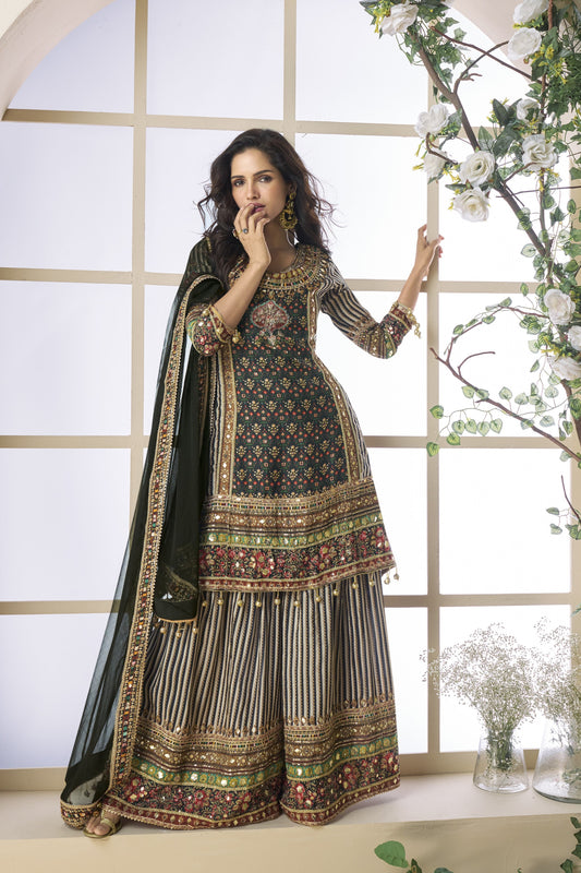 Black and grey color palazzo suit in viscose fabric with hand zari and embellished work, blending modern tones with traditional elegance for festive wear.
