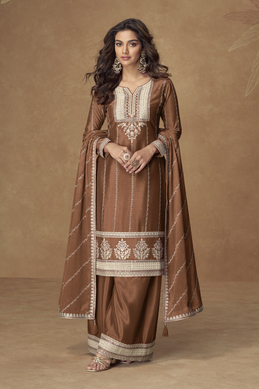 Brown color palazzo suit with embroidery work, featuring warm earthy tones and traditional detailing perfect for festive and formal occasions.
