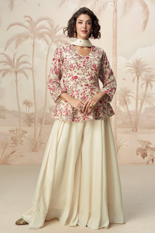 Elegant white palazzo set with soft fabric and simple design, perfect for casual wear or festive gatherings.
