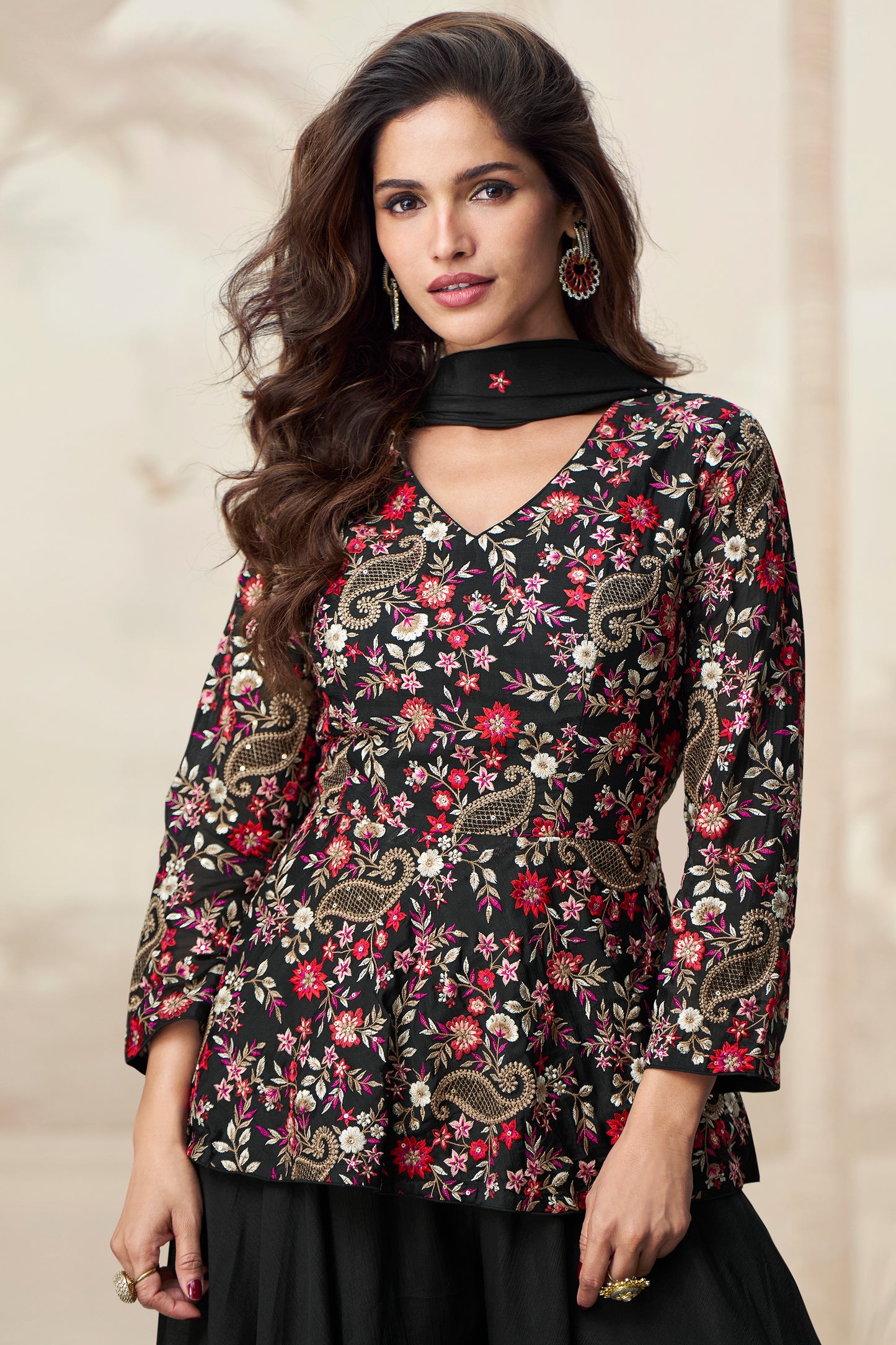 Classic black palazzo outfit with a stylish look, perfect for evening events and festive occasions.
