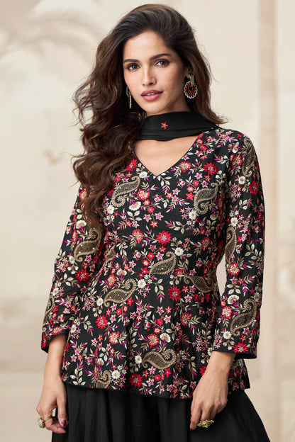 Classic black palazzo outfit with a stylish look, perfect for evening events and festive occasions.

