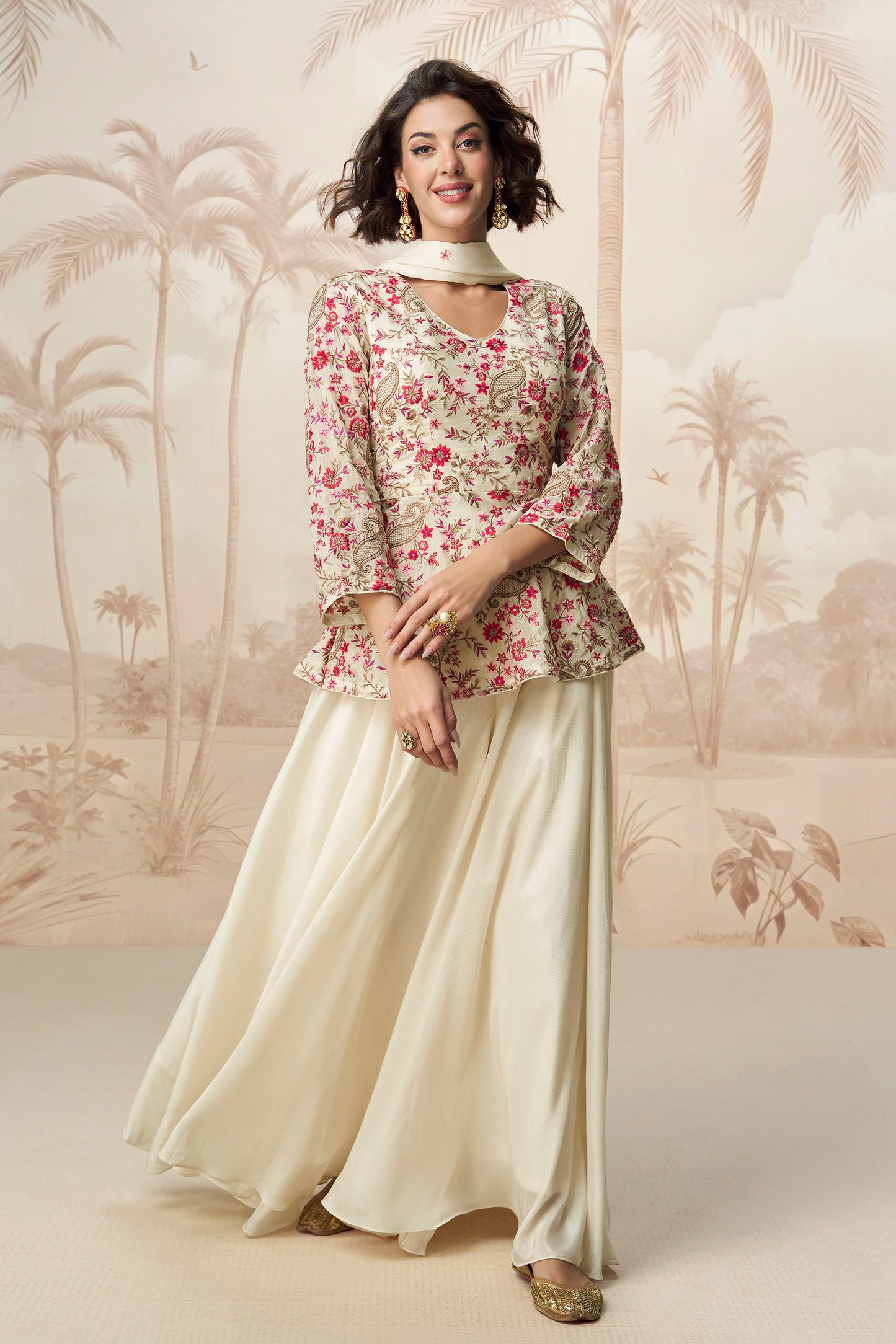 Elegant white palazzo set with soft fabric and simple design, perfect for casual wear or festive gatherings.
