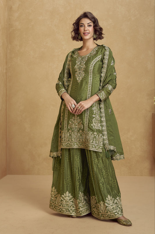 Elegant dark green outfit with a royal touch, perfect for mehndi functions, evening parties, and festive occasions.
