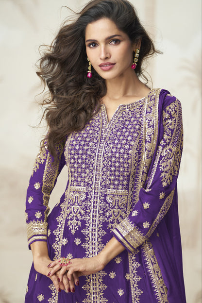 Purple color palazzo suit with embroidery work, showcasing a regal and elegant appeal ideal for festive and traditional celebrations.
