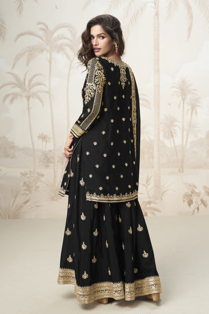 Black color palazzo suit with embroidery work, delivering a classic and elegant look perfect for festive, evening, and formal occasions.
