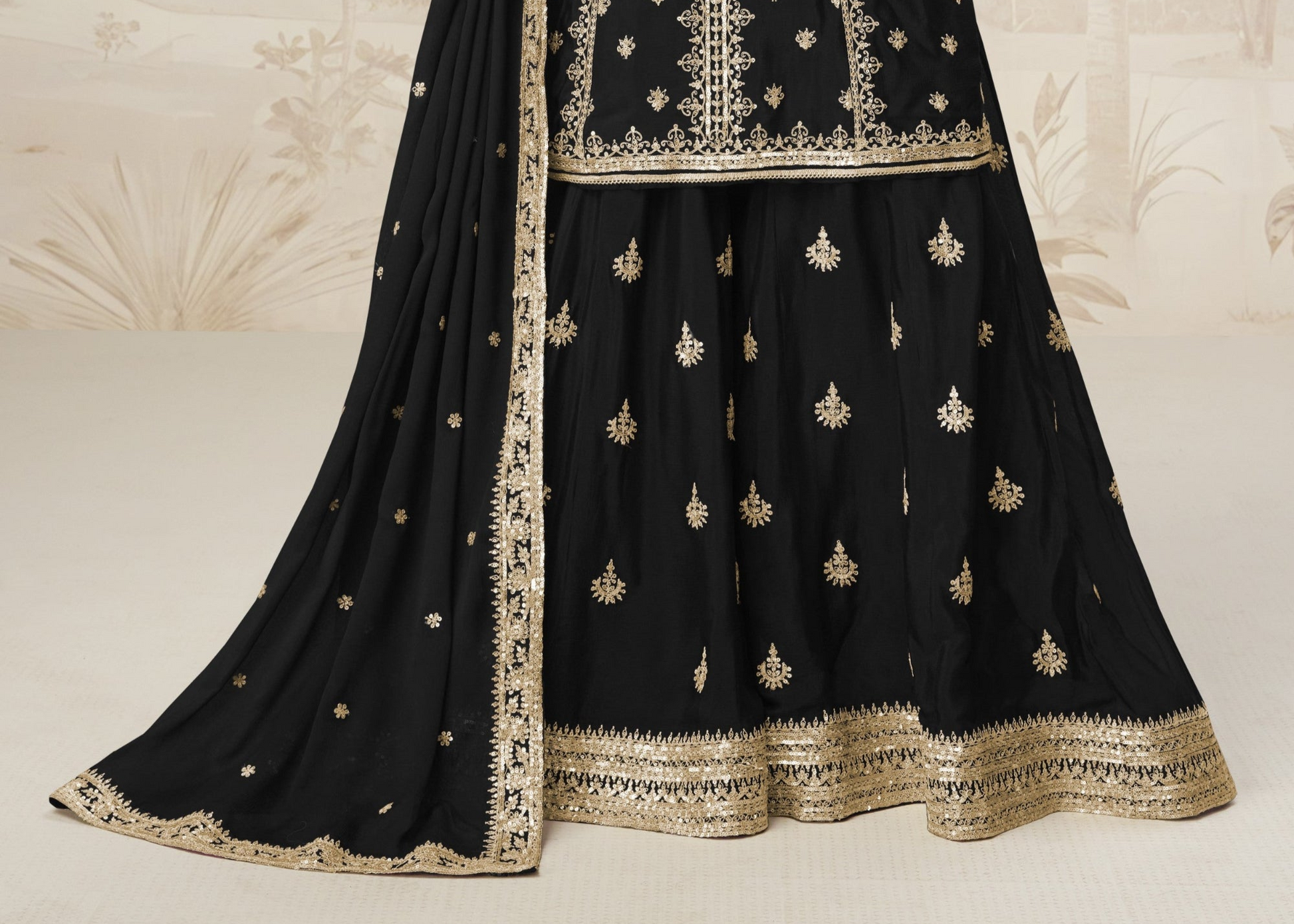 Black color palazzo suit with embroidery work, delivering a classic and elegant look perfect for festive, evening, and formal occasions.
