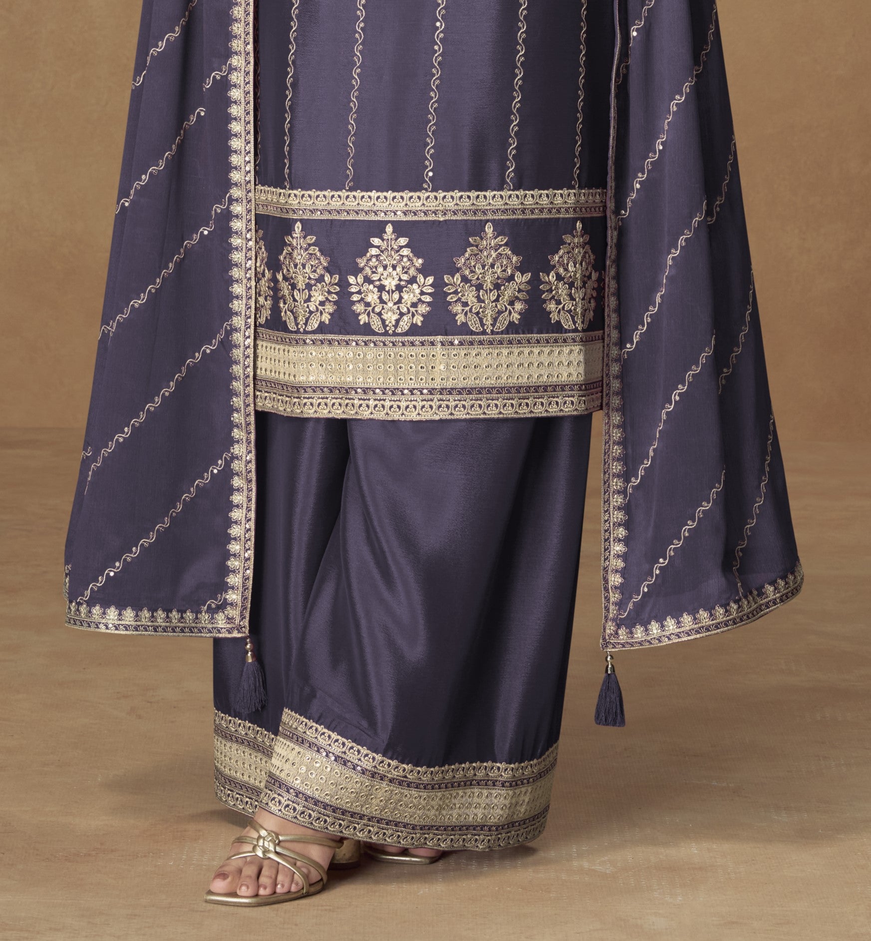 Navy blue color palazzo suit with embroidery work, showcasing a deep and elegant style perfect for festive gatherings and traditional events.
