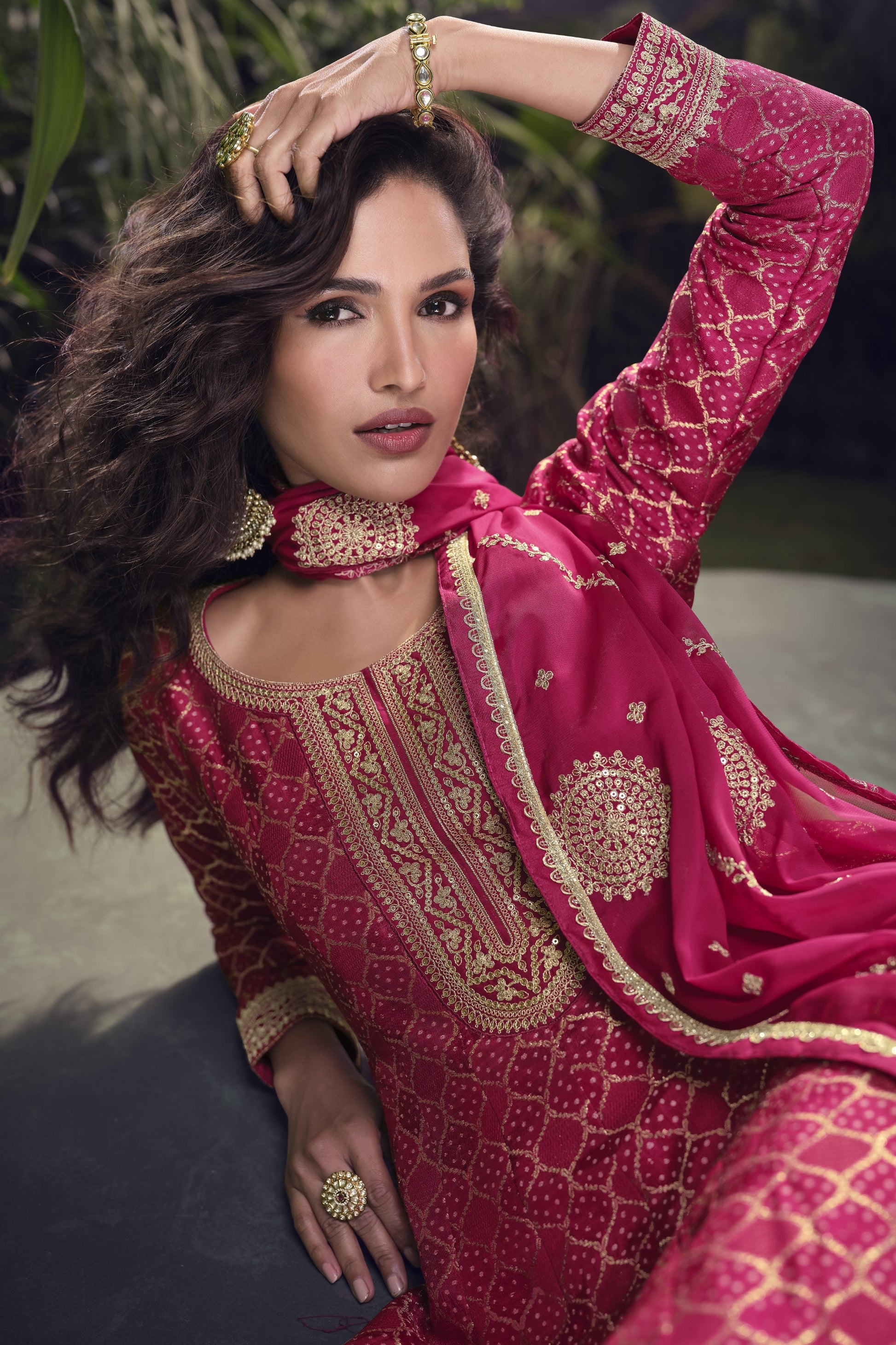 Pink color Anarkali gown in pure viscose silk with embroidery work, offering a graceful and refined look for festive and special occasions.
