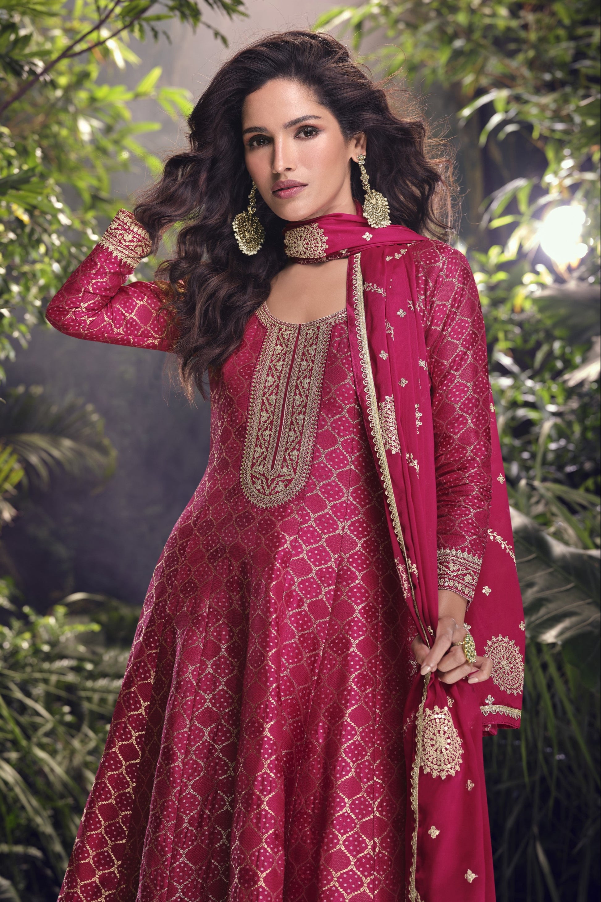 Pink color Anarkali gown in pure viscose silk with embroidery work, offering a graceful and refined look for festive and special occasions.
