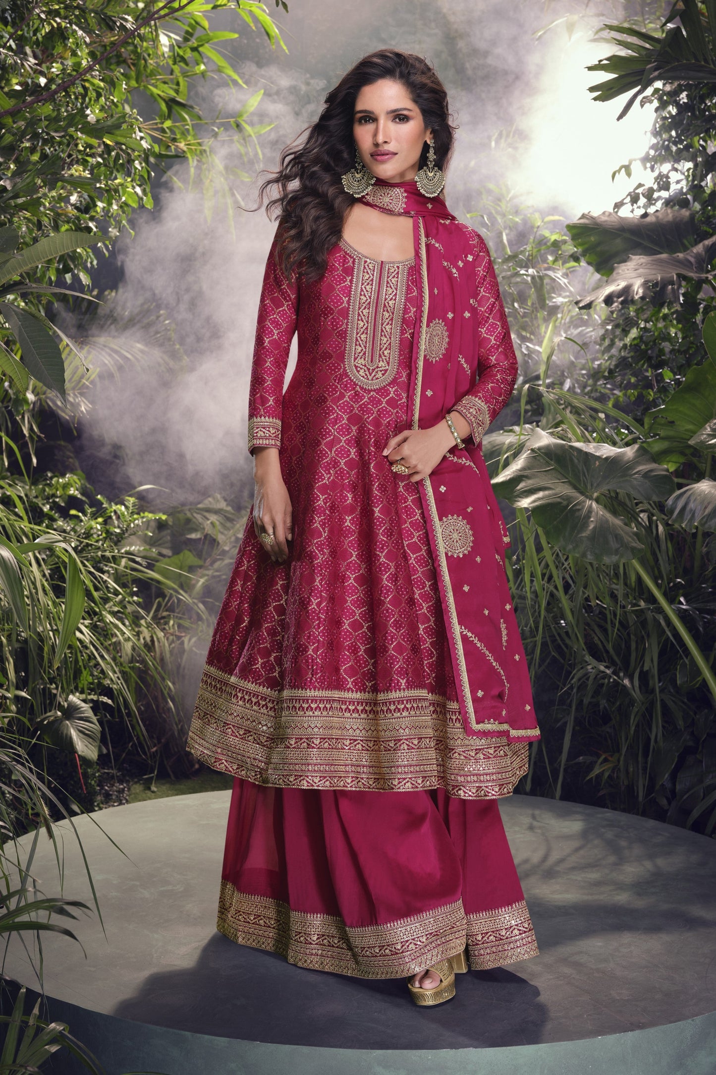 Pink color Anarkali gown in pure viscose silk with embroidery work, offering a graceful and refined look for festive and special occasions.
