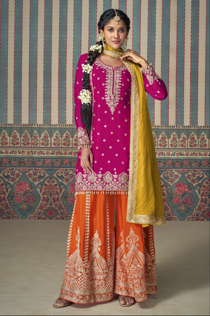 Dark pink color palazzo suit in Chinon silk fabric with embroidery work, offering a vibrant and elegant look for festive and special occasions.
