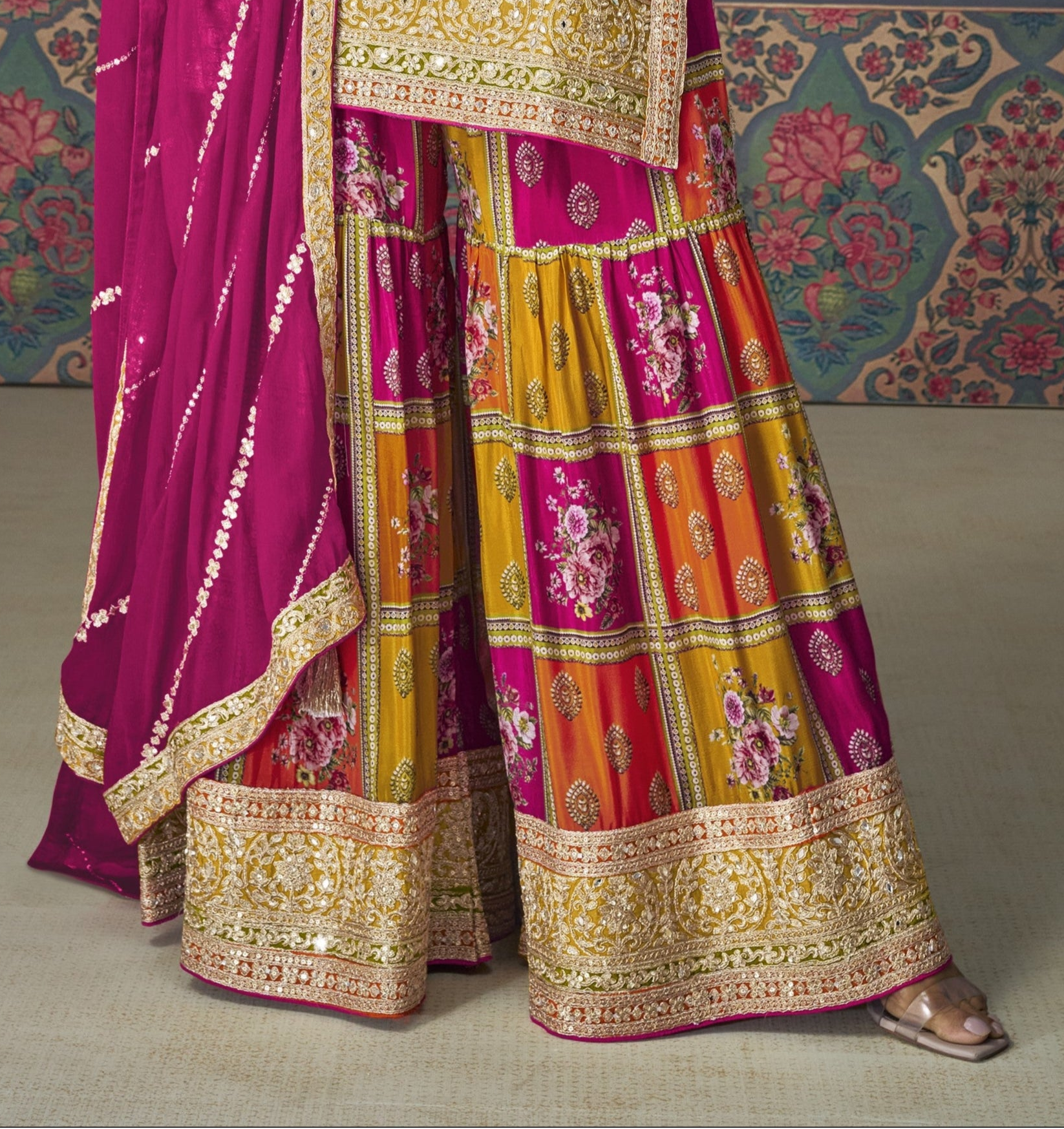 Orange color palazzo suit in Chinon silk fabric with embroidery work, radiating festive vibrance and graceful charm for special celebrations.
