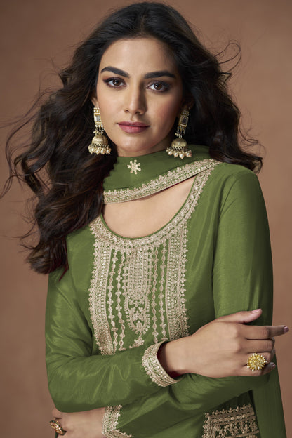 Dark green color palazzo suit with embroidery work, showcasing a rich and elegant look perfect for festive and cultural celebrations.
