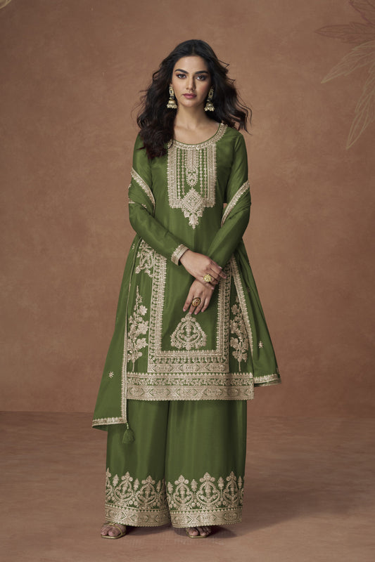 Dark green color palazzo suit with embroidery work, showcasing a rich and elegant look perfect for festive and cultural celebrations.
