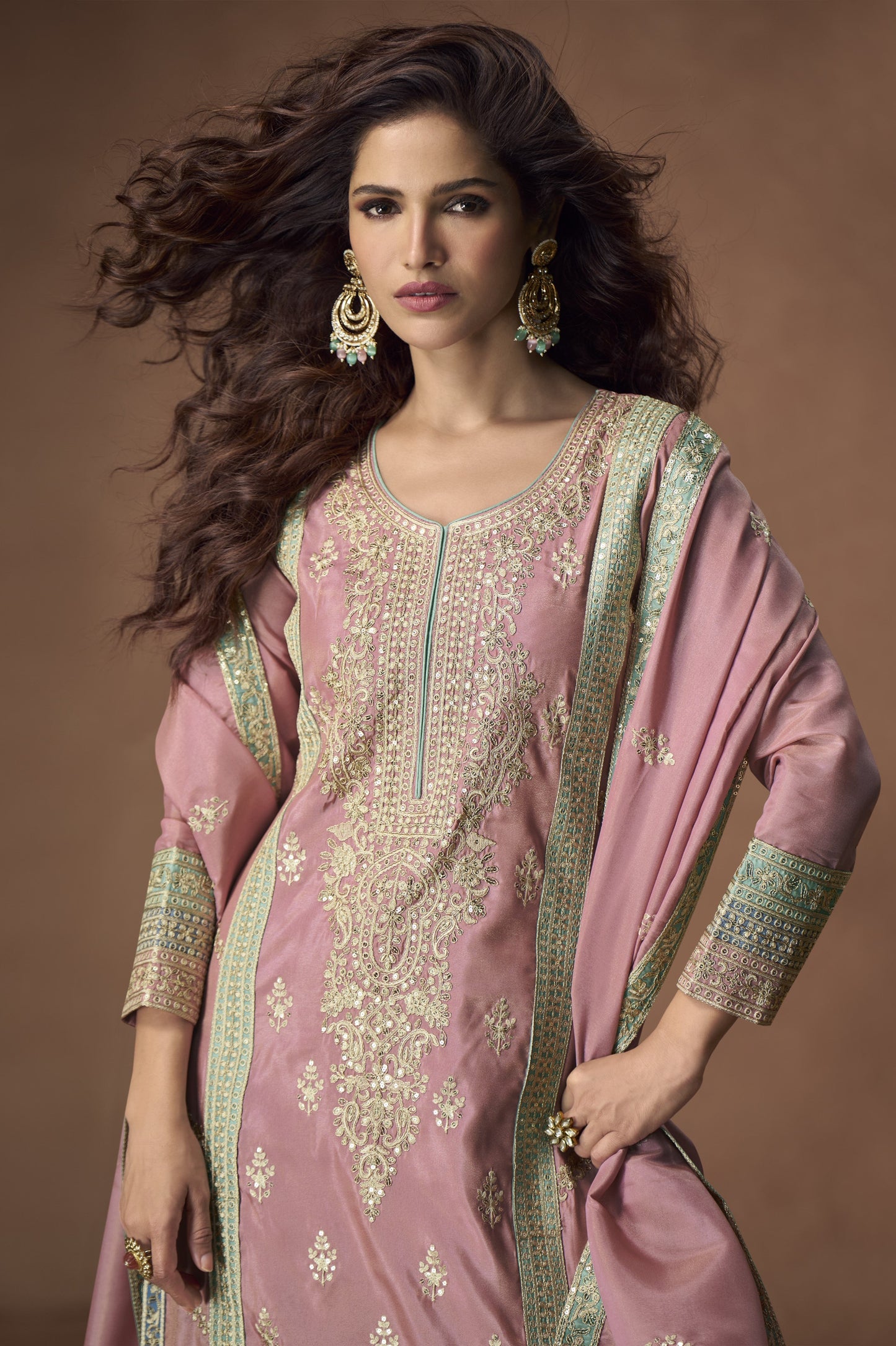 Graceful rose gold outfit with a touch of shimmer, perfect for weddings, receptions, and elegant evening events.
