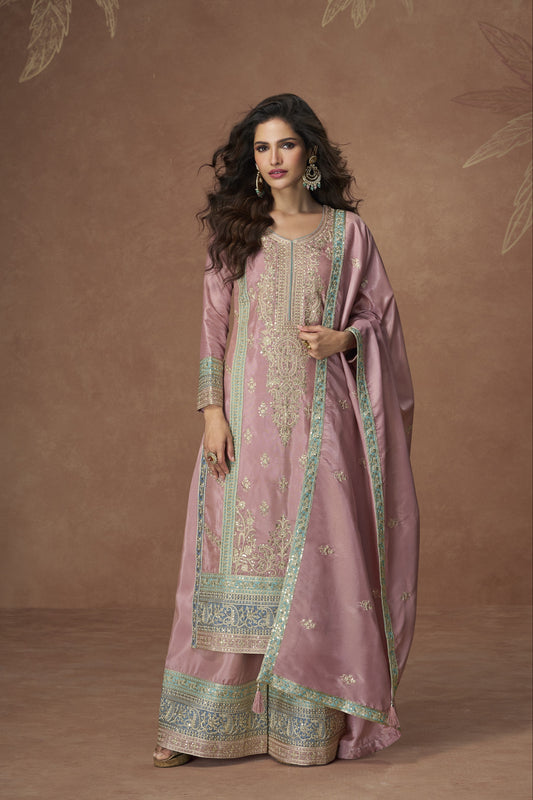 Graceful rose gold outfit with a touch of shimmer, perfect for weddings, receptions, and elegant evening events.
