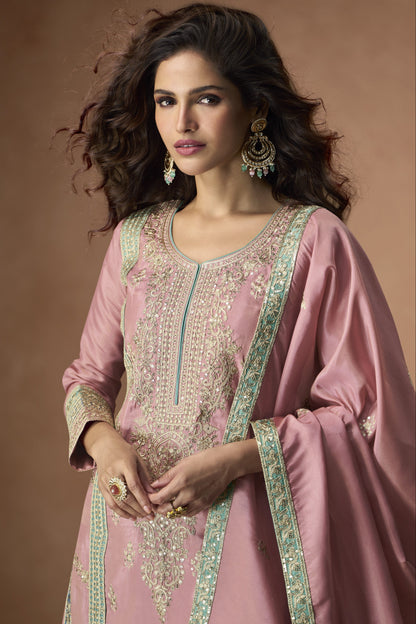 Graceful rose gold outfit with a touch of shimmer, perfect for weddings, receptions, and elegant evening events.
