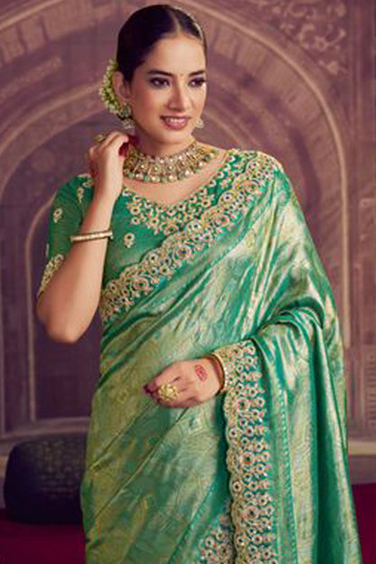 Close-Up of Green Designer Saree With Sequin Work And Digital Print Border - Traditional Indian Party Wear