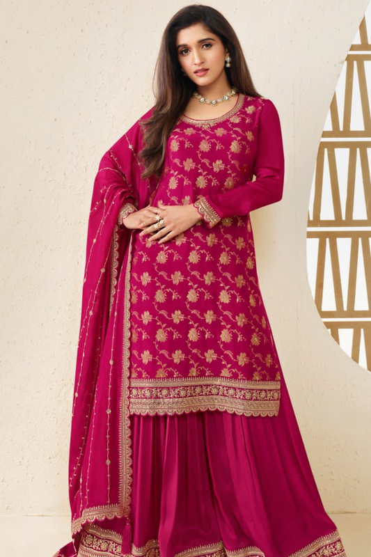 A Woman Wearing a Traditional Pakistani Salwar Kameez Dupatta Suit 