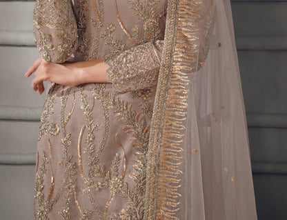 Brown salwar kameez gives a warm, grounded, and earthy feel