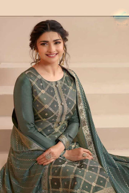 Grey salwar kameez looks simple and stylish. Metallic accents make it modern.

