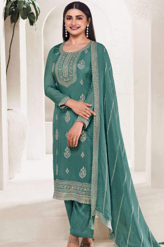 Teal salwar kameez is cool and refreshing. It blends blue and green for a unique look