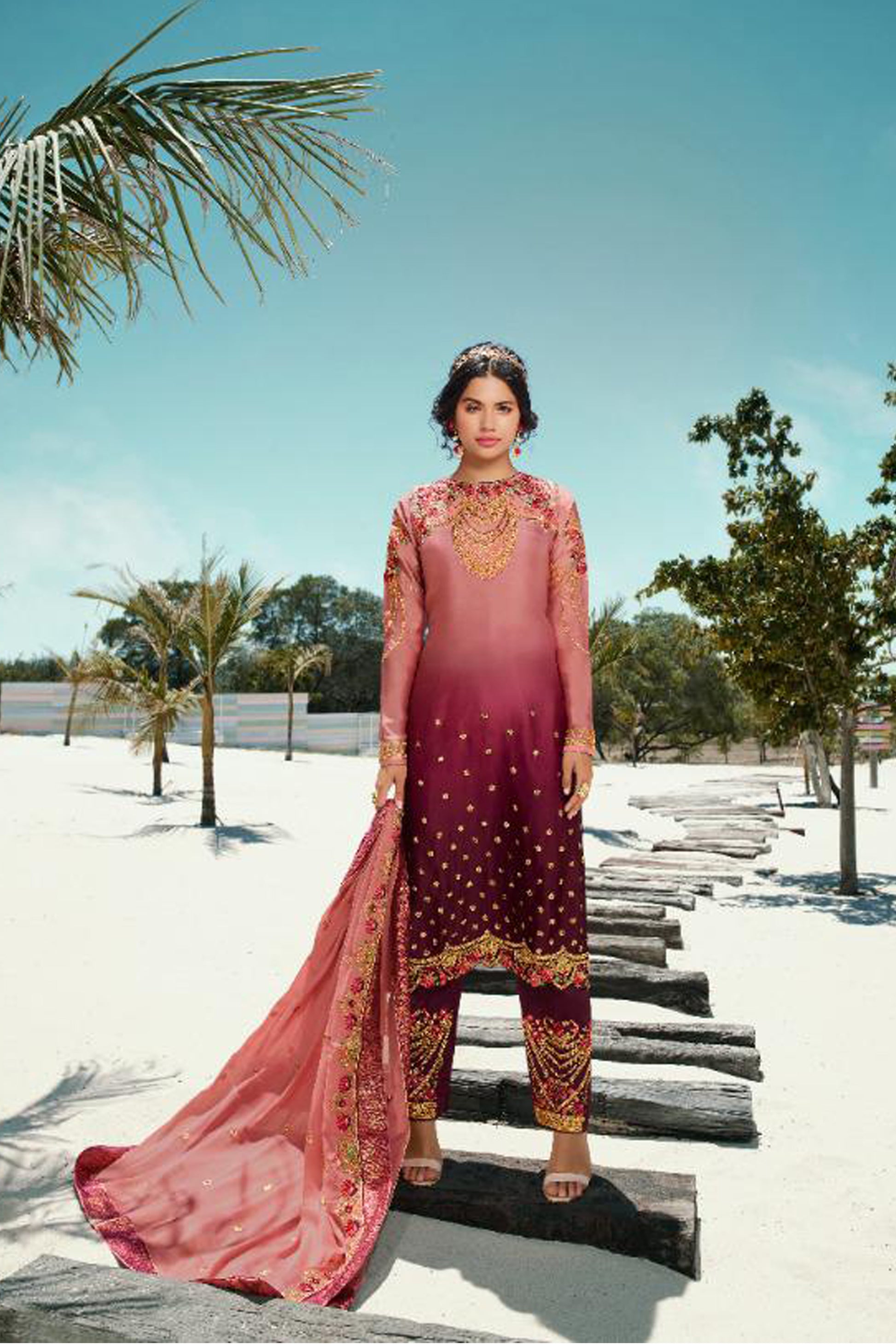 Pink salwar kameez is cheerful and lovely. Perfect for celebrations.
