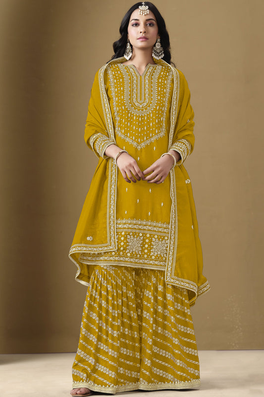 Yellow salwar kameez is bright and happy. Good for haldi or sunny events.
