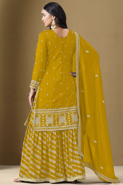 Yellow salwar kameez is bright and happy. Good for haldi or sunny events.
