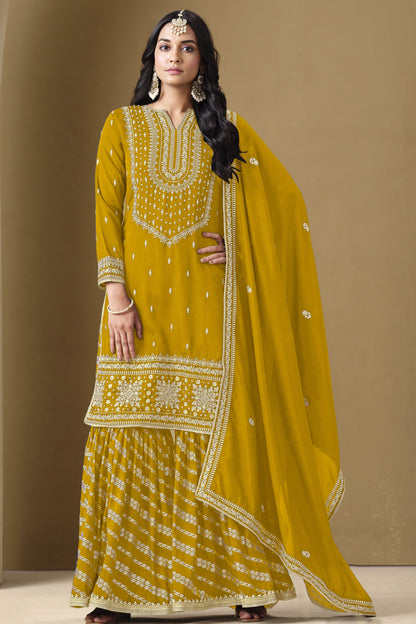 Yellow salwar kameez is bright and happy. Good for haldi or sunny events.
