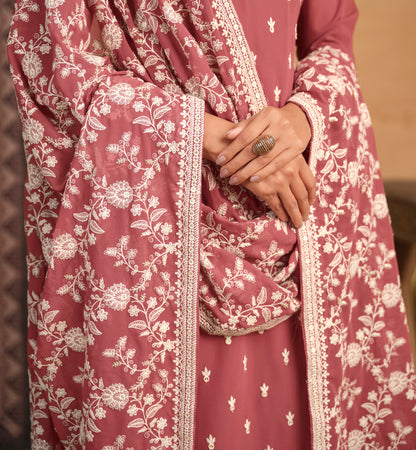 Peach salwar kameez brings soft elegance and warmth, perfect for daytime celebrations and festive charm.