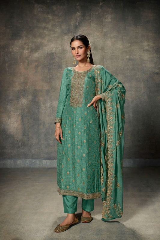 Teal salwar kameez is cool and refreshing. It blends blue and green for a unique look