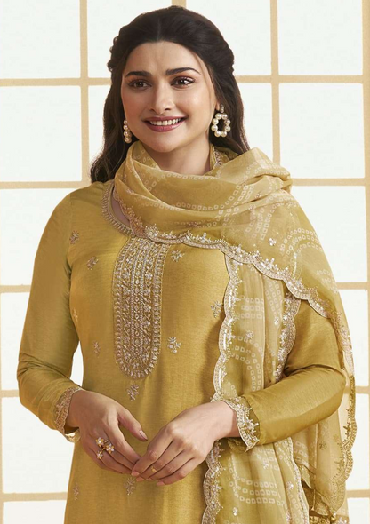 Yellow salwar kameez is bright and happy. Good for haldi or sunny events.
