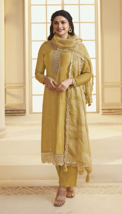 Yellow salwar kameez is bright and happy. Good for haldi or sunny events.
