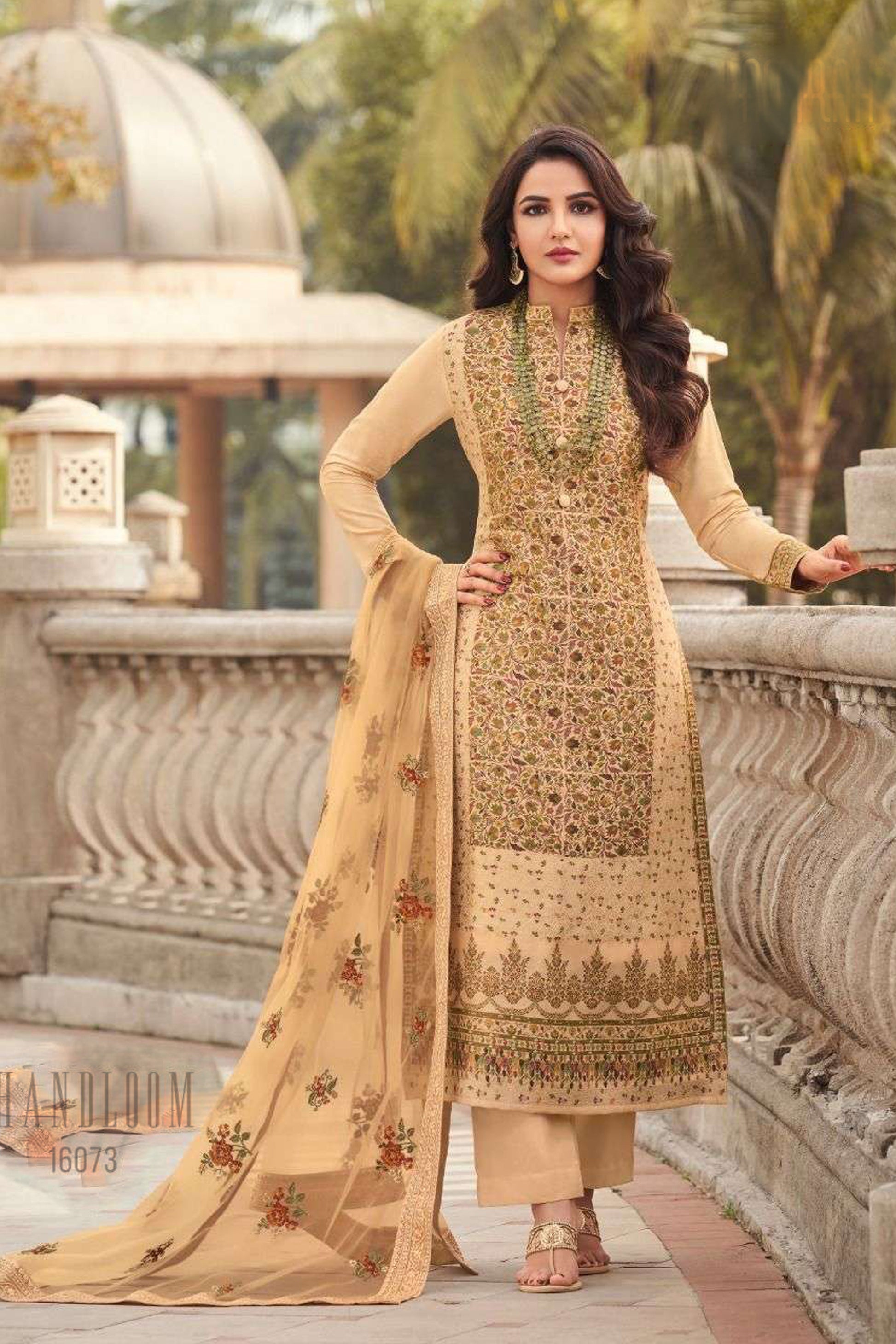 Gold salwar kameez looks royal and festive. Great for parties and celebrations.
