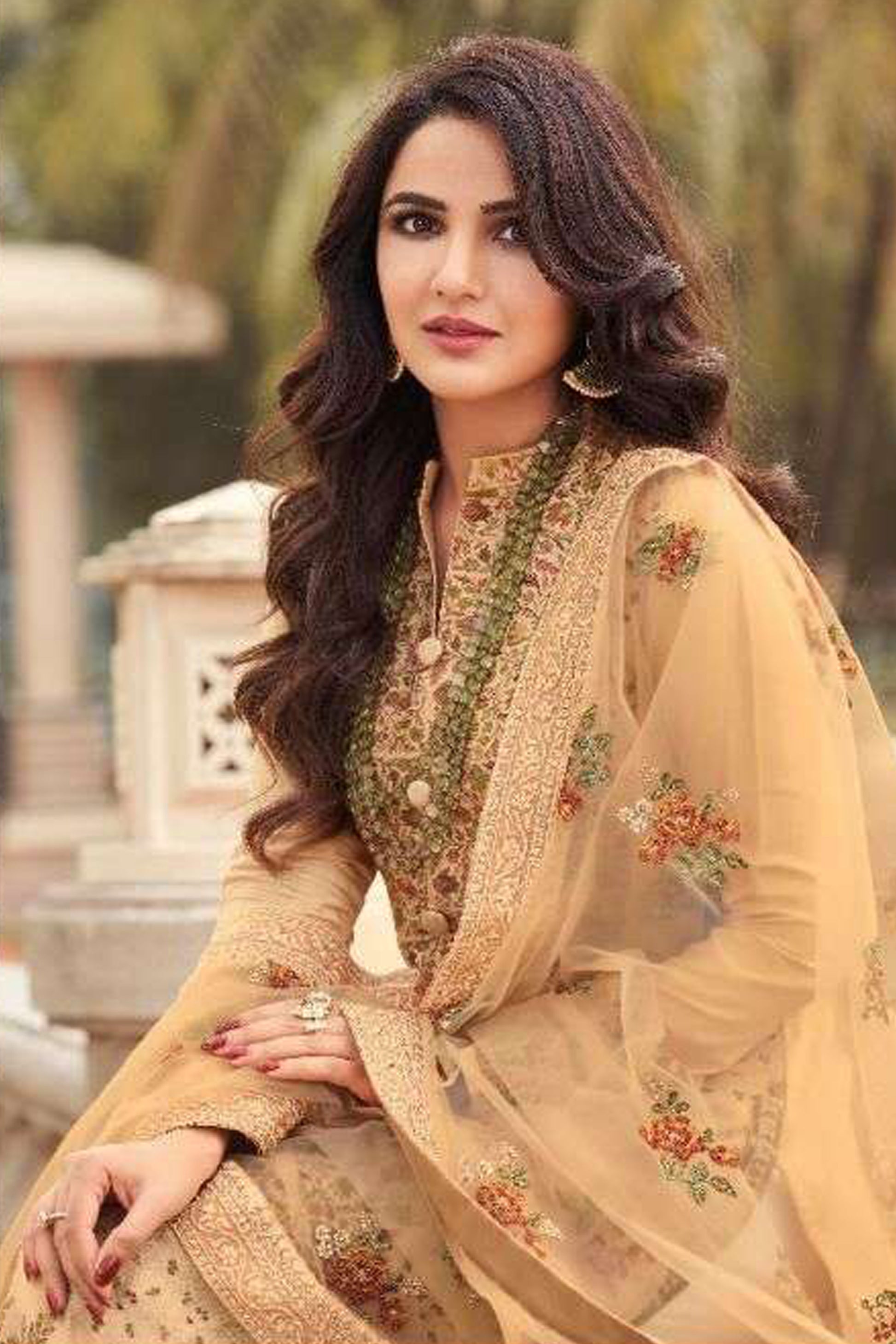 Gold salwar kameez looks royal and festive. Great for parties and celebrations.
