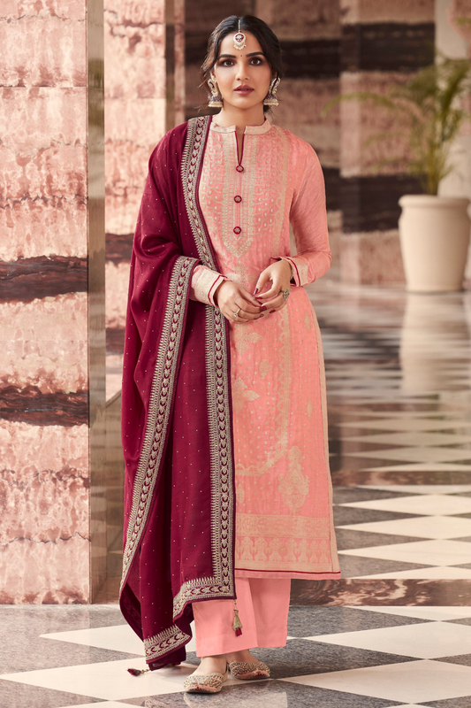 Peach salwar kameez brings soft elegance and warmth, perfect for daytime celebrations and festive charm.