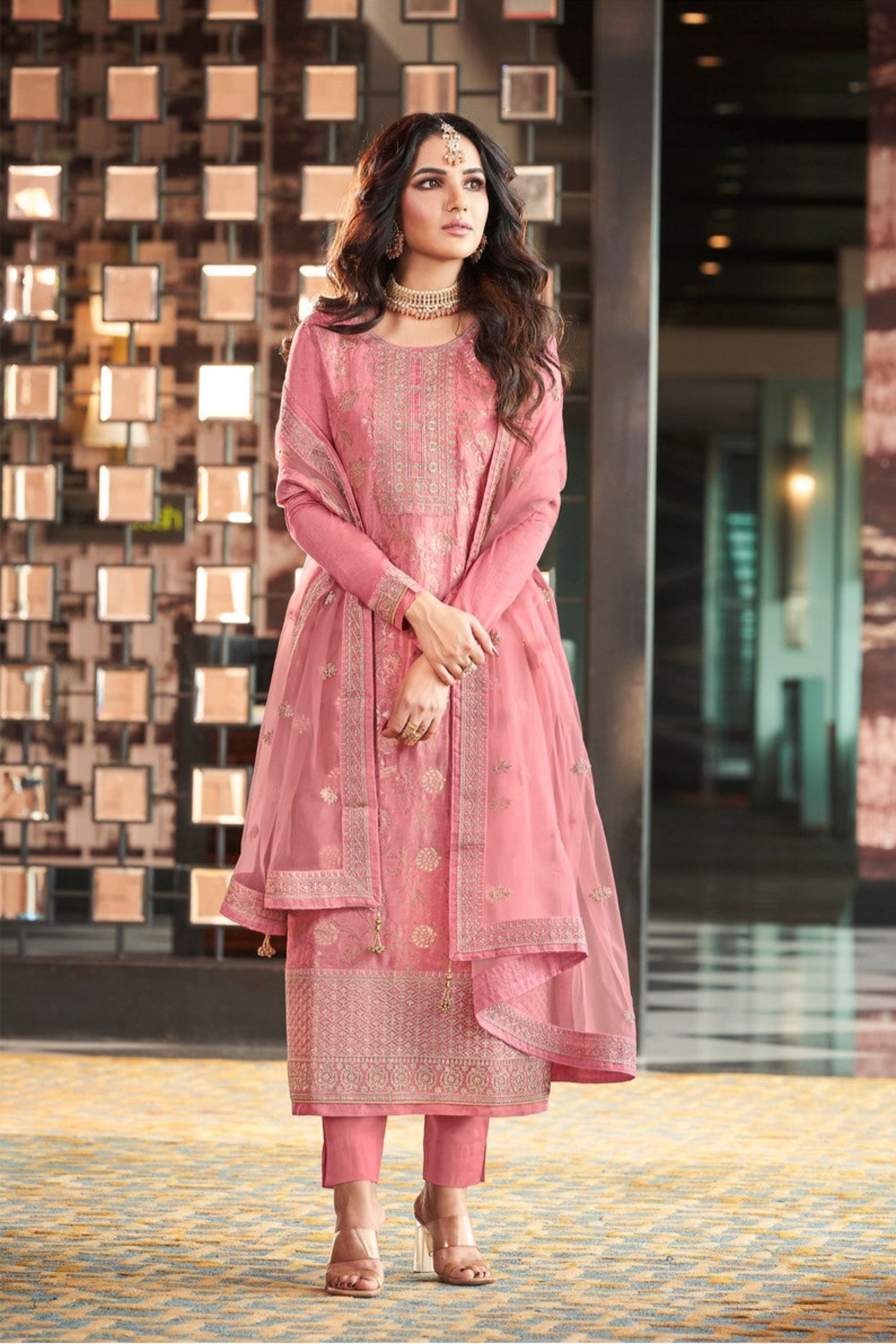 Pink salwar kameez is cheerful and lovely. Perfect for celebrations.
