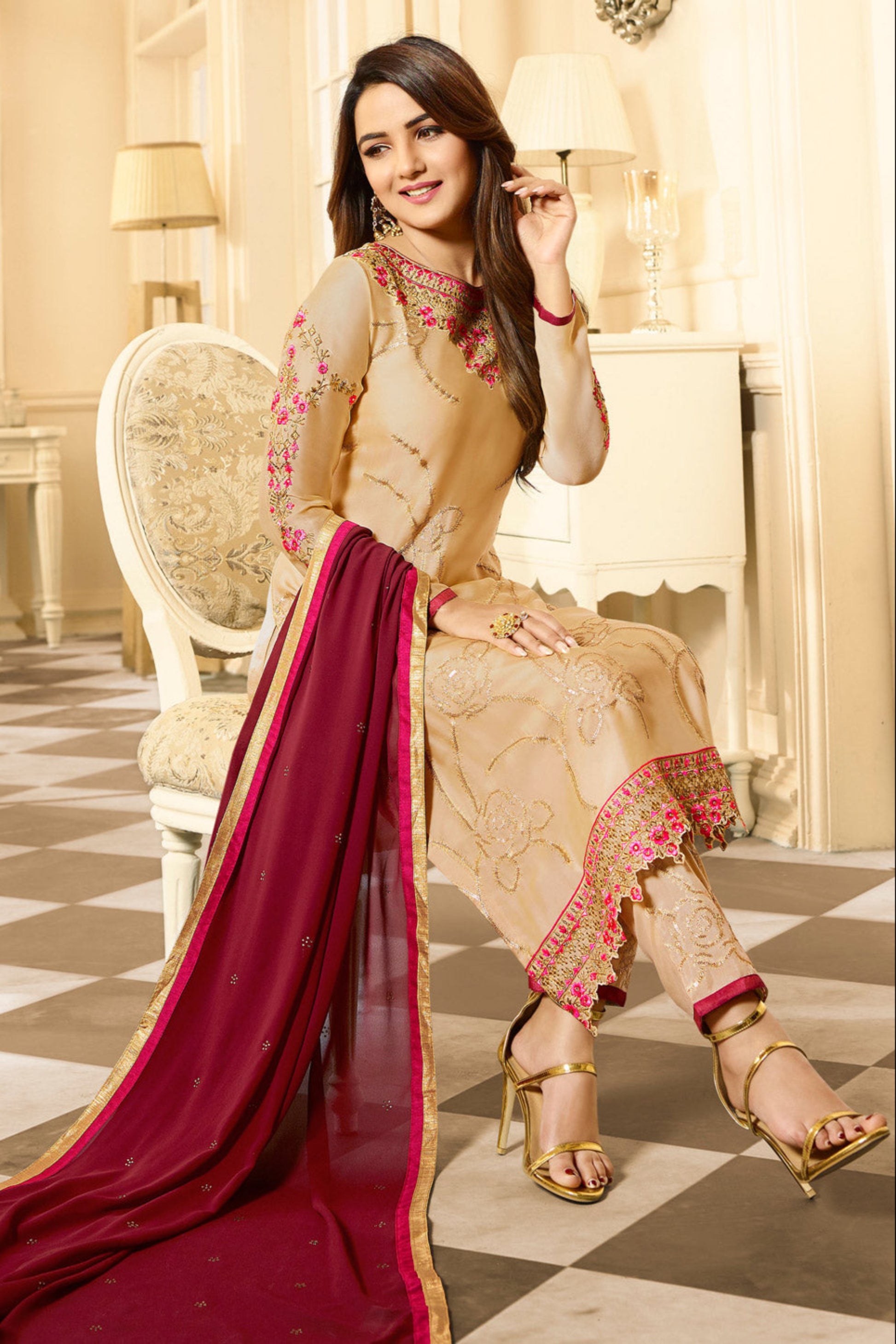 Gold salwar kameez looks royal and festive. Great for parties and celebrations.
