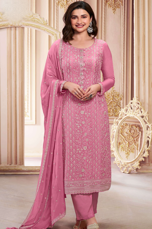 Pink salwar kameez is cheerful and lovely. Perfect for celebrations.
