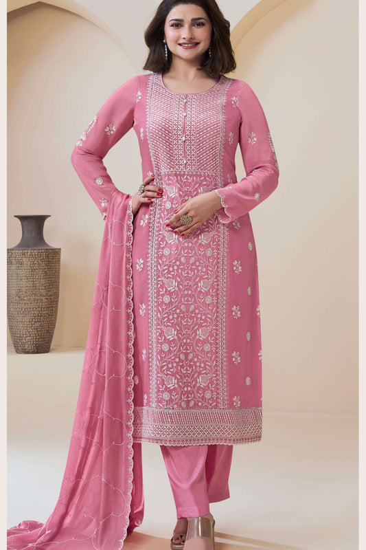 Pink salwar kameez is cheerful and lovely. Perfect for celebrations.
