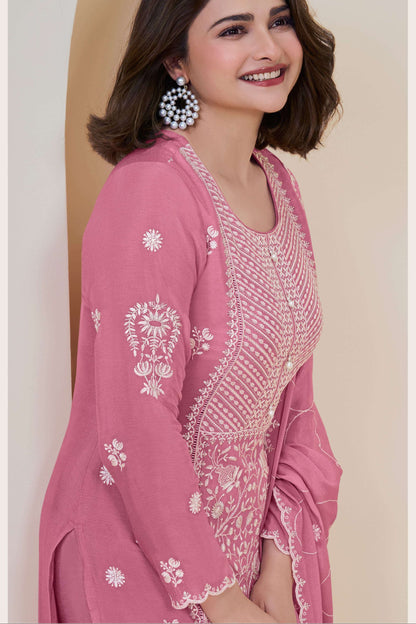 Pink salwar kameez is cheerful and lovely. Perfect for celebrations.
