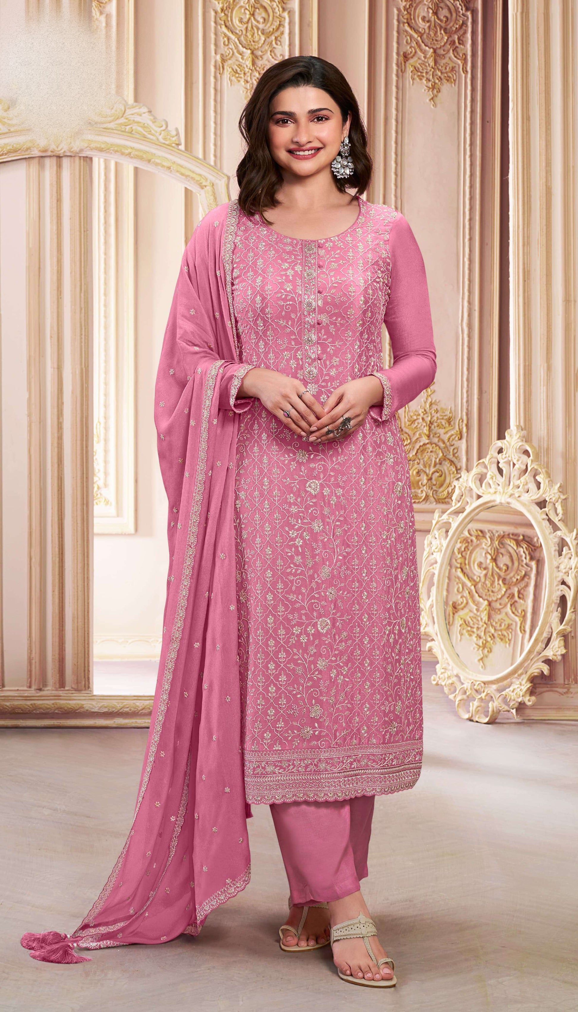 Pink salwar kameez is cheerful and lovely. Perfect for celebrations.
