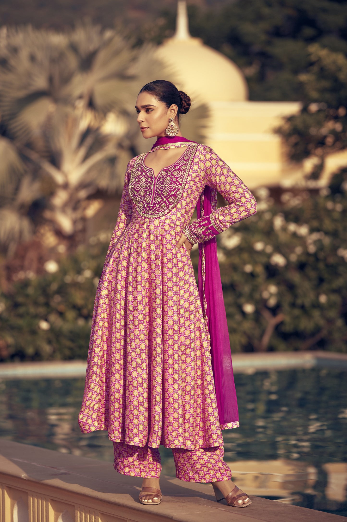 Light pink color salwar kameez in Chinon silk fabric, adorned with delicate embroidery work, offering a soft and elegant look for festive and special occasions.
