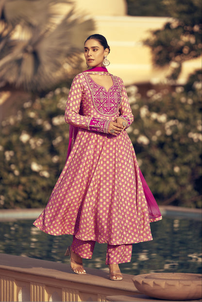 Light pink color salwar kameez in Chinon silk fabric, adorned with delicate embroidery work, offering a soft and elegant look for festive and special occasions.

