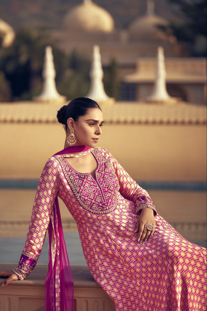 Light pink color salwar kameez in Chinon silk fabric, adorned with delicate embroidery work, offering a soft and elegant look for festive and special occasions.
