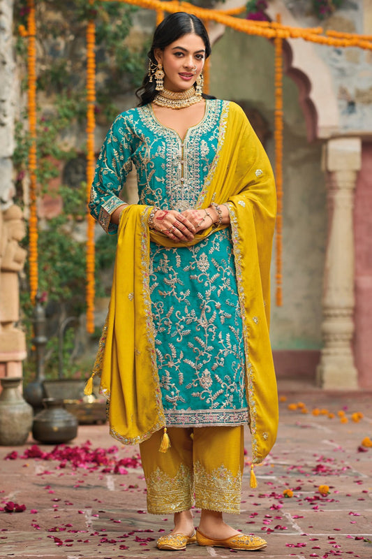 Teal salwar kameez is cool and refreshing. It blends blue and green for a unique look