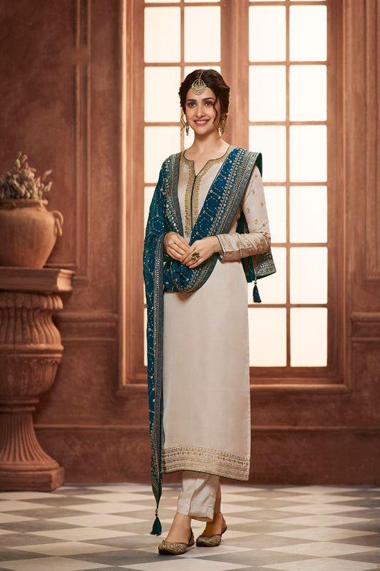 White salwar kameez is pure and classic. Ivory with embroidery looks soft and pretty.
