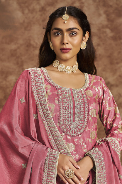 Pink salwar kameez is cheerful and lovely. Perfect for celebrations.

